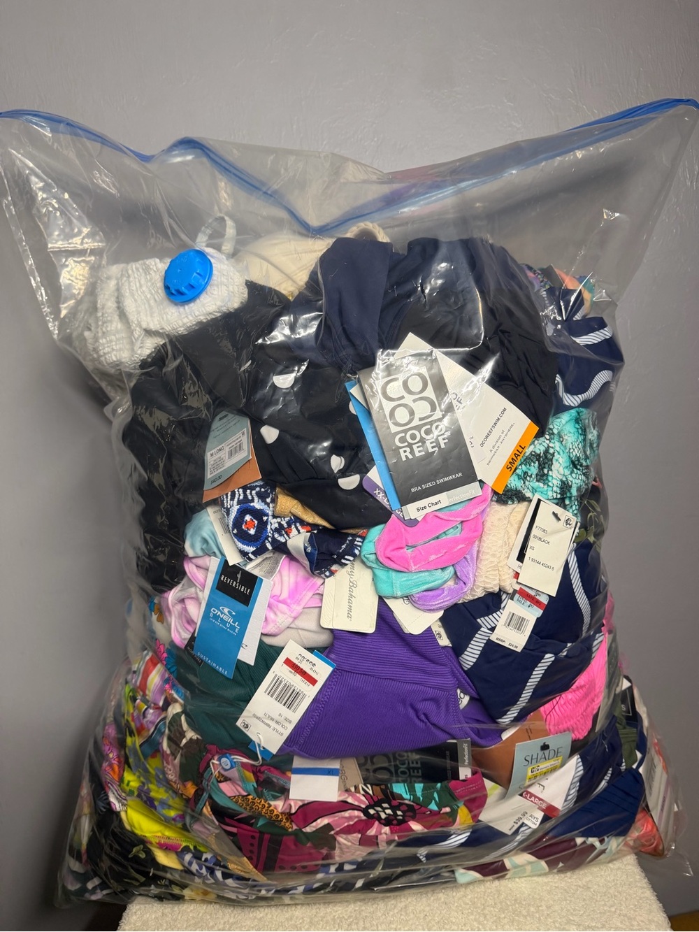 Bulk 100+ Assorted Women's swimsuits one pieces and Separates! 3,000$ retail!